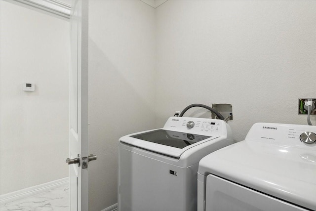 laundry area with washer and dryer