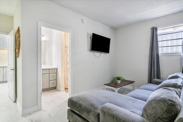 bedroom featuring connected bathroom