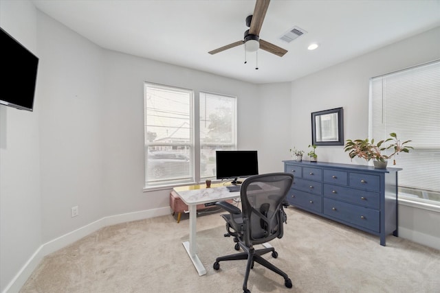 office area featuring ceiling fan and light colored carpet