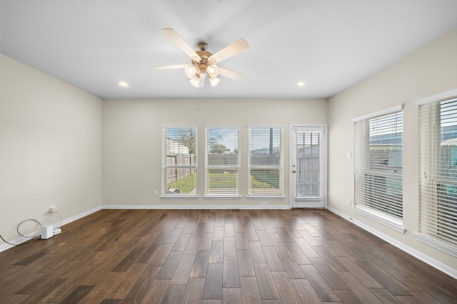 spare room featuring a wealth of natural light and ceiling fan