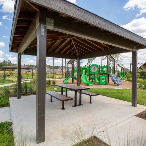 surrounding community with a gazebo and a playground