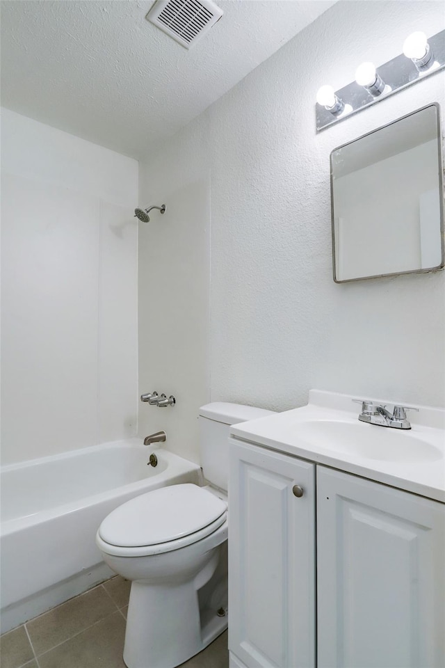 full bathroom featuring tile patterned floors, vanity,  shower combination, a textured ceiling, and toilet