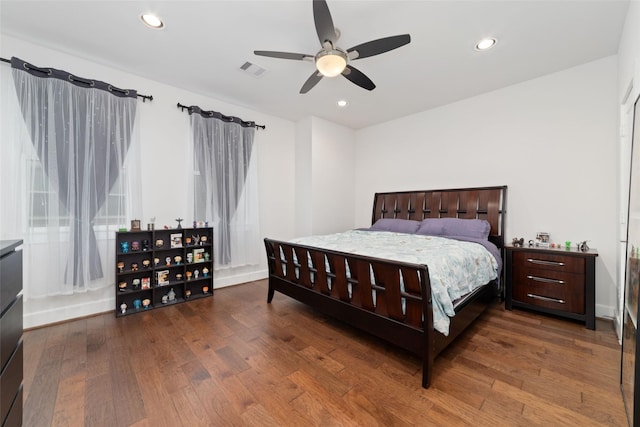 bedroom with hardwood / wood-style flooring and ceiling fan