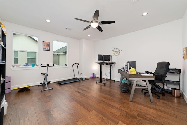 interior space featuring ceiling fan and dark wood-type flooring