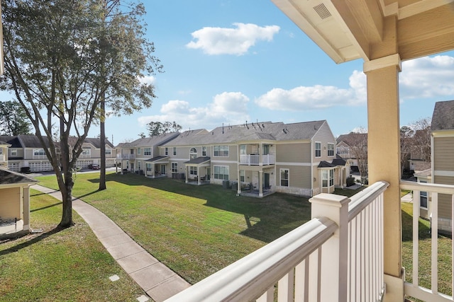 balcony with a residential view and visible vents