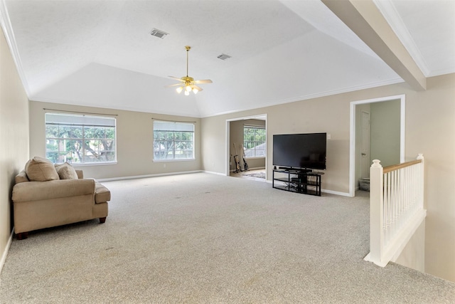 living room featuring light carpet, ceiling fan, vaulted ceiling, and ornamental molding