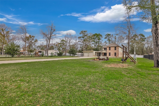 view of yard featuring a garage