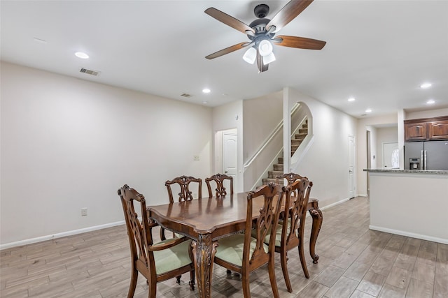 dining area featuring ceiling fan