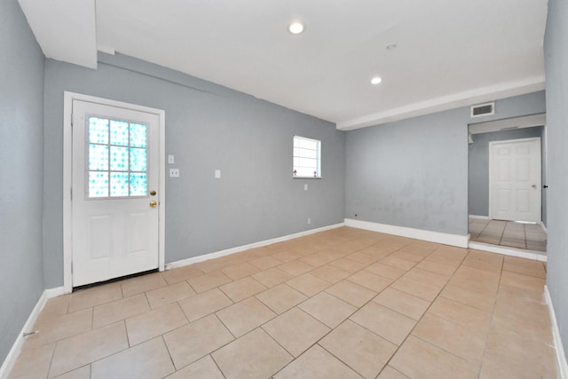 empty room featuring light tile patterned flooring