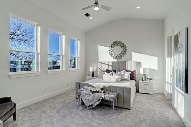 bedroom featuring light carpet, ceiling fan, and lofted ceiling