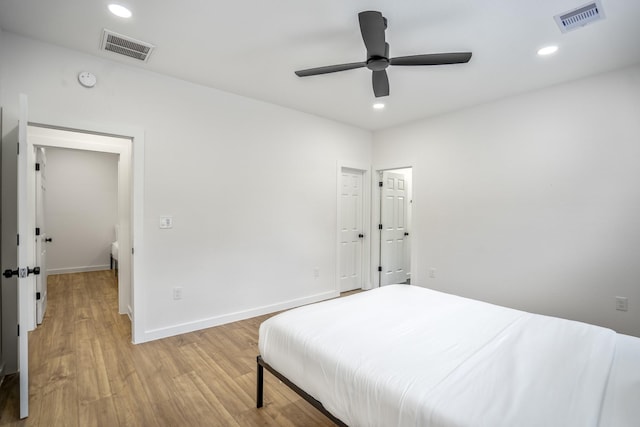 bedroom featuring light wood-type flooring and ceiling fan