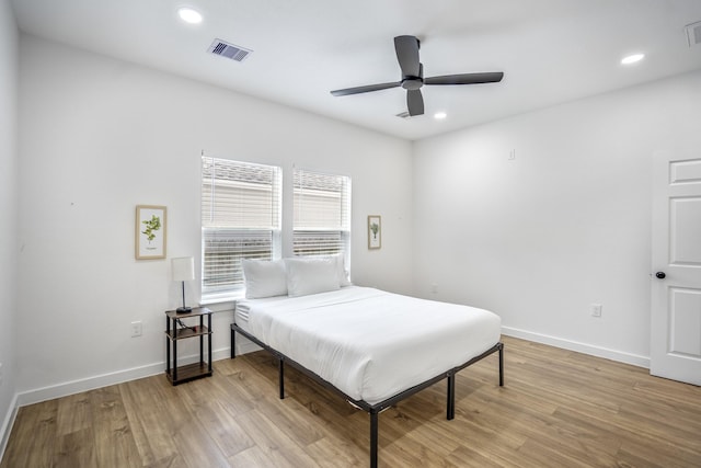 bedroom featuring ceiling fan and light wood-type flooring