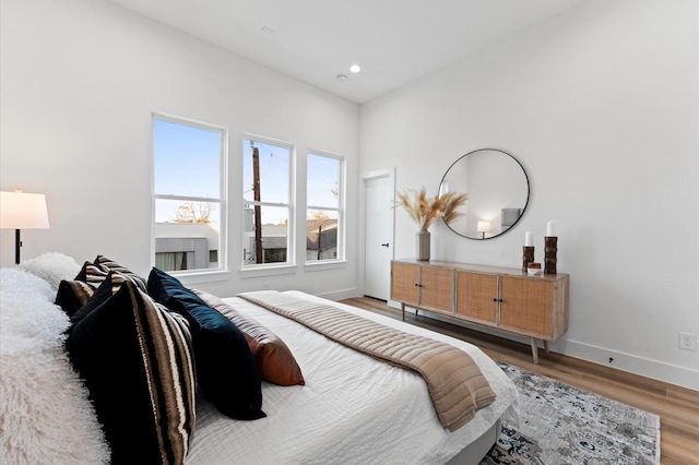 bedroom featuring wood-type flooring