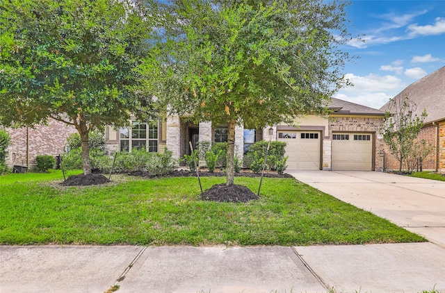 obstructed view of property with a garage and a front yard