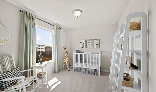 bedroom featuring light colored carpet