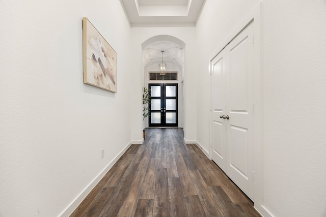 entryway featuring french doors and dark wood-type flooring