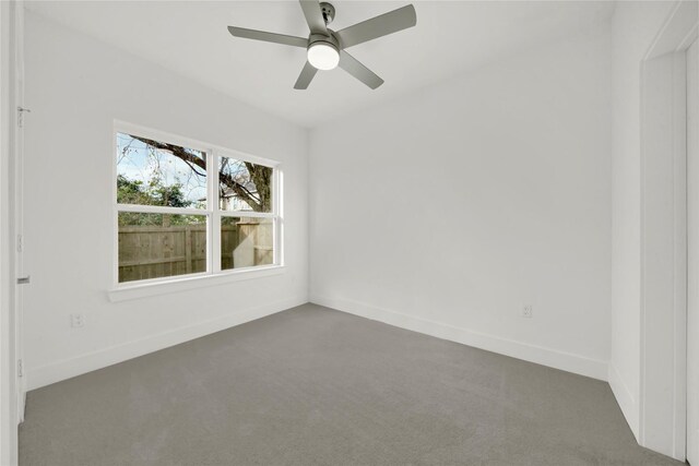 spare room with ceiling fan