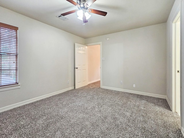 unfurnished bedroom with carpet flooring and ceiling fan