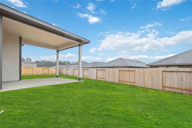 view of yard with a patio area