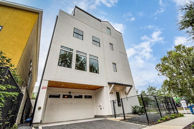 view of property featuring a garage