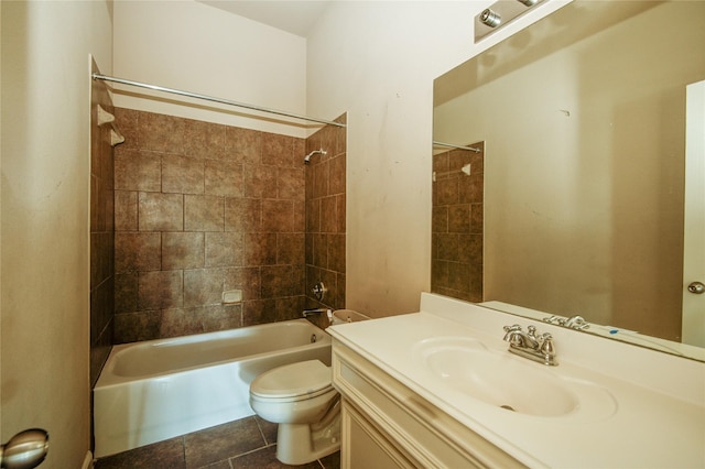 full bathroom with tile patterned floors, vanity, toilet, and tiled shower / bath