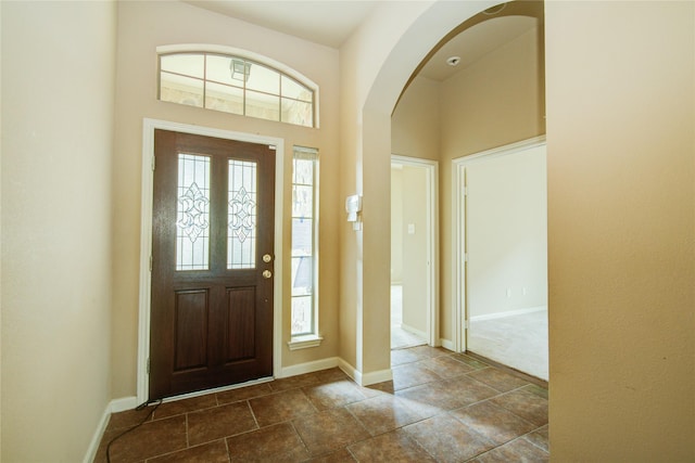 foyer entrance featuring a wealth of natural light