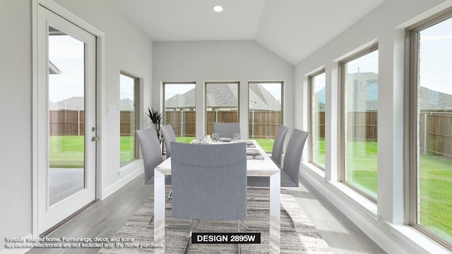 unfurnished sunroom with vaulted ceiling