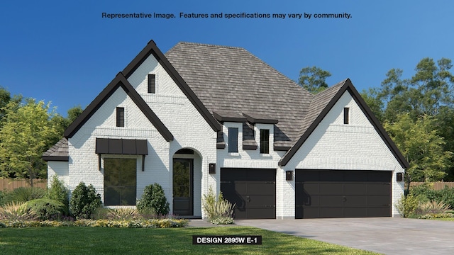 view of front of house with a front lawn and a garage