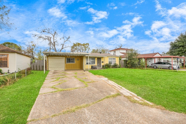 single story home with a front yard and a garage