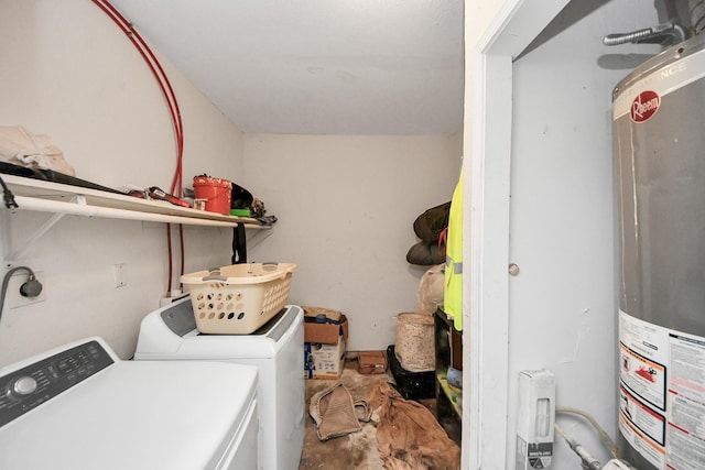 laundry area with washing machine and dryer and water heater