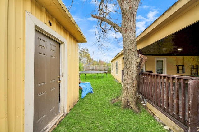 view of yard featuring a trampoline