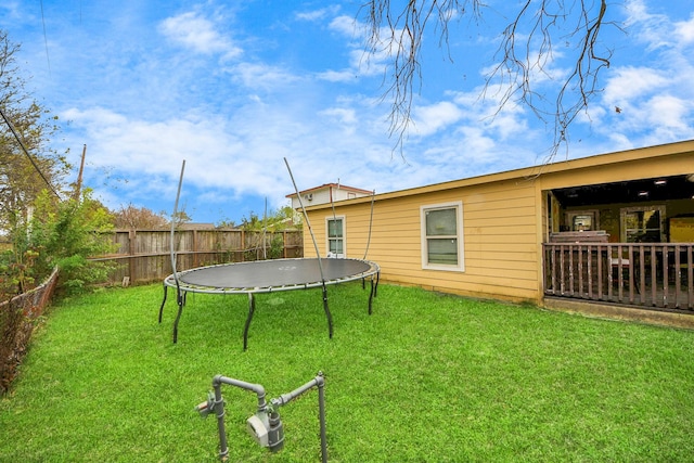 view of yard featuring a trampoline