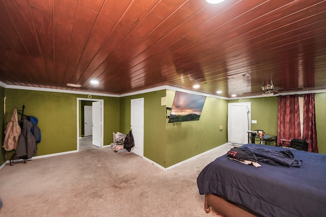 carpeted bedroom with ornamental molding