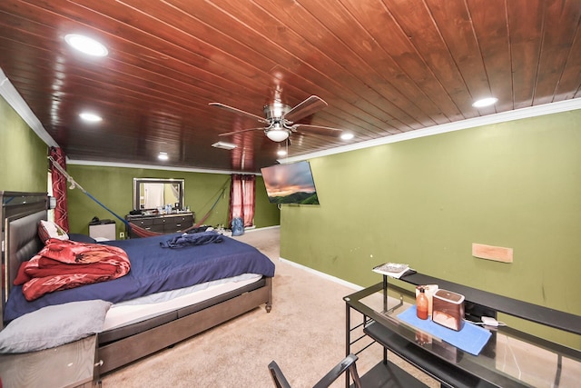 carpeted bedroom with ceiling fan and crown molding