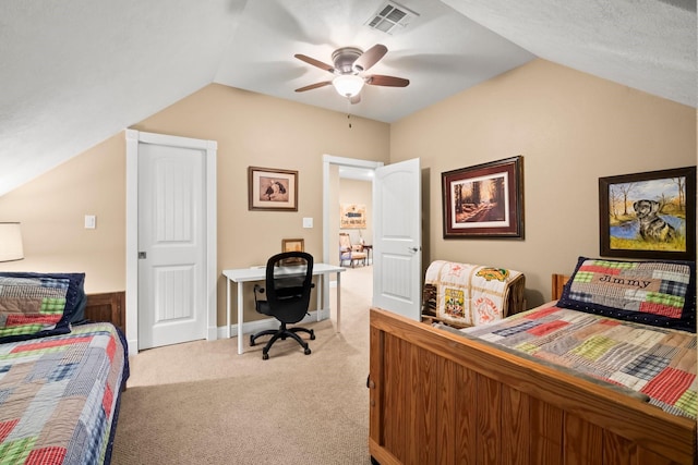 bedroom featuring ceiling fan, light colored carpet, and lofted ceiling