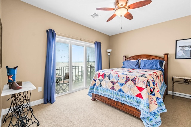 carpeted bedroom featuring ceiling fan and access to exterior