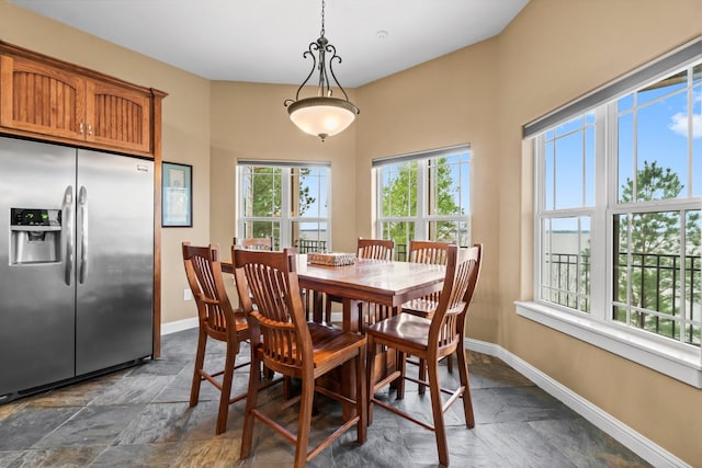 dining area featuring plenty of natural light