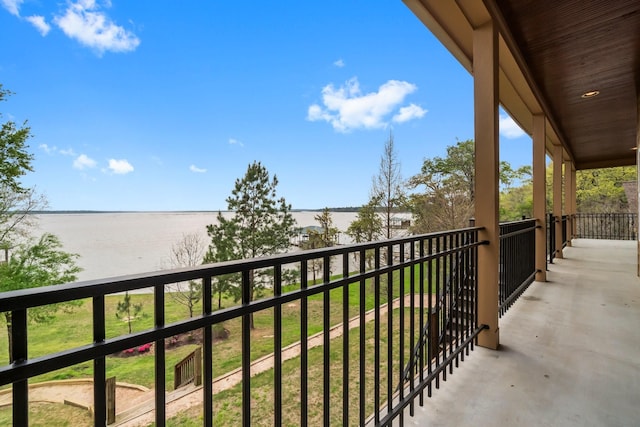 balcony featuring a water view