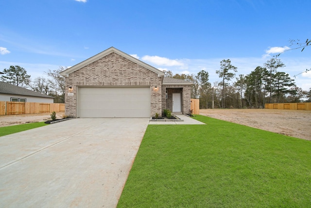 16902 Needlepoint Dr, Conroe, TX 77302 - view of front of house with a garage and a front yard