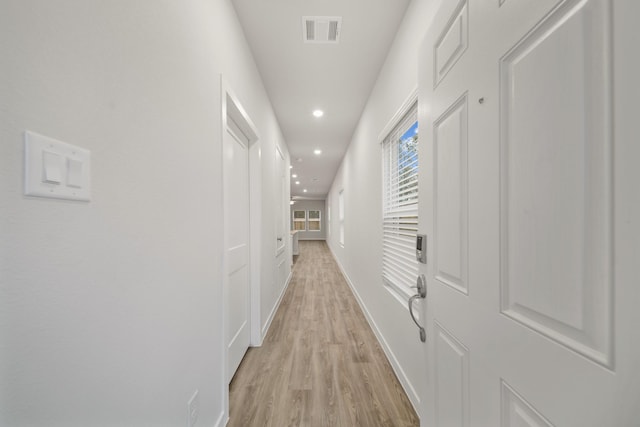 hallway featuring light hardwood / wood-style floors