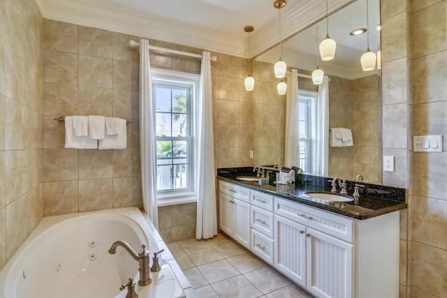 bathroom featuring tile patterned floors, vanity, crown molding, and tile walls