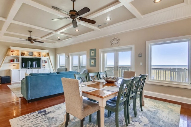 dining room with beam ceiling, french doors, dark wood-type flooring, and coffered ceiling