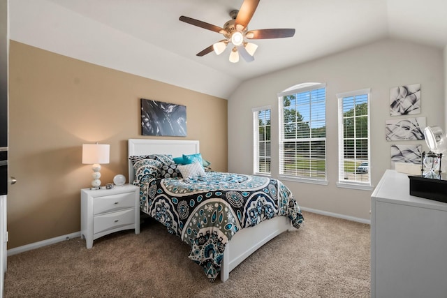 bedroom with ceiling fan, carpet floors, and vaulted ceiling