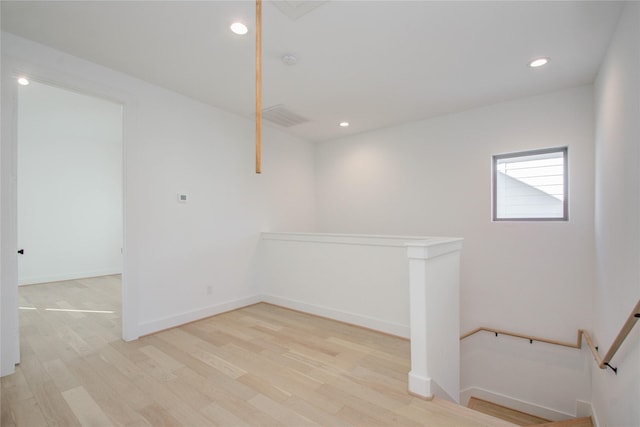 unfurnished room featuring light hardwood / wood-style flooring