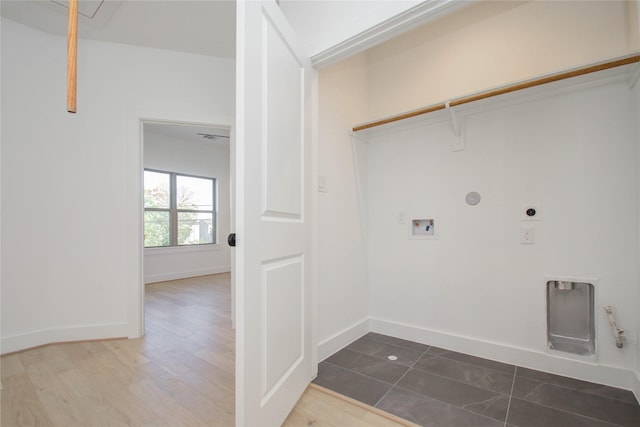 washroom featuring hookup for a gas dryer, hookup for a washing machine, and hookup for an electric dryer