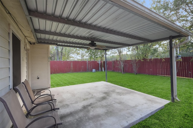 view of patio featuring ceiling fan