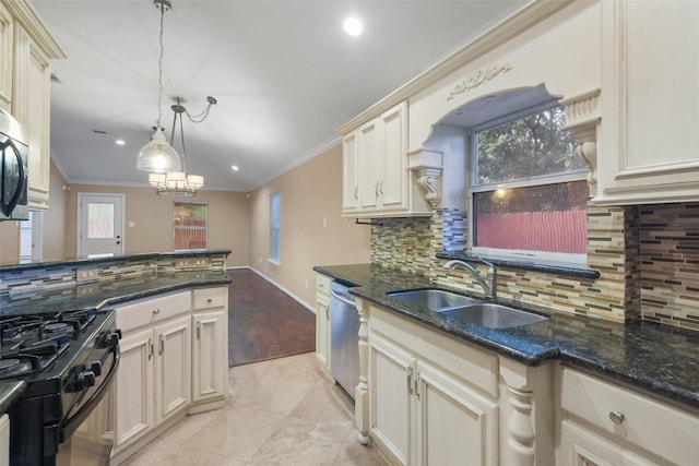 kitchen featuring sink, stainless steel dishwasher, black gas range oven, tasteful backsplash, and decorative light fixtures