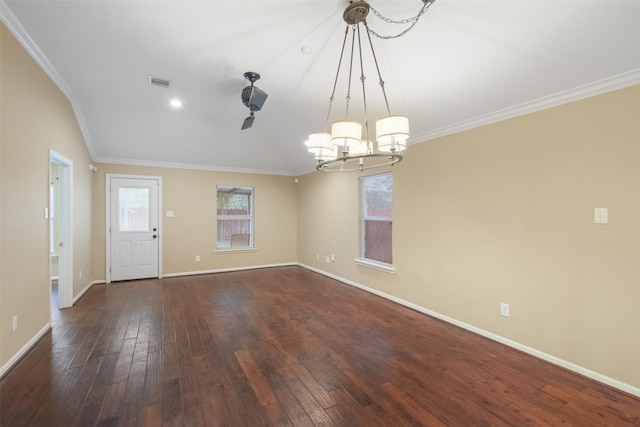 interior space with dark hardwood / wood-style flooring, crown molding, and a chandelier