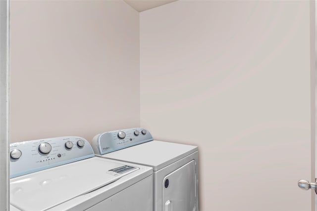 laundry area featuring washing machine and dryer