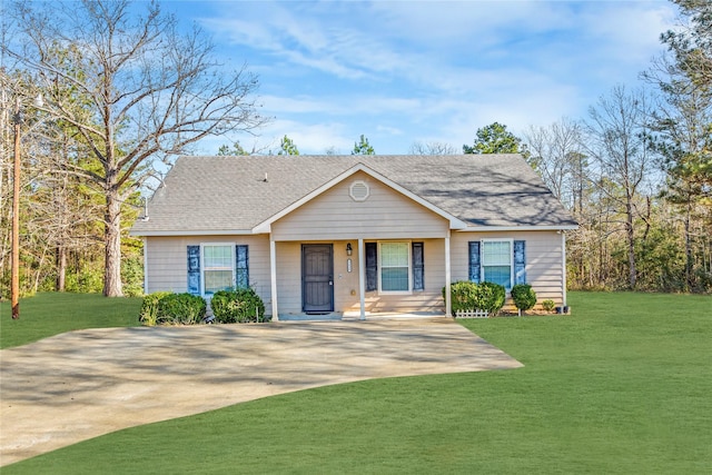 view of front of home with covered porch and a front lawn